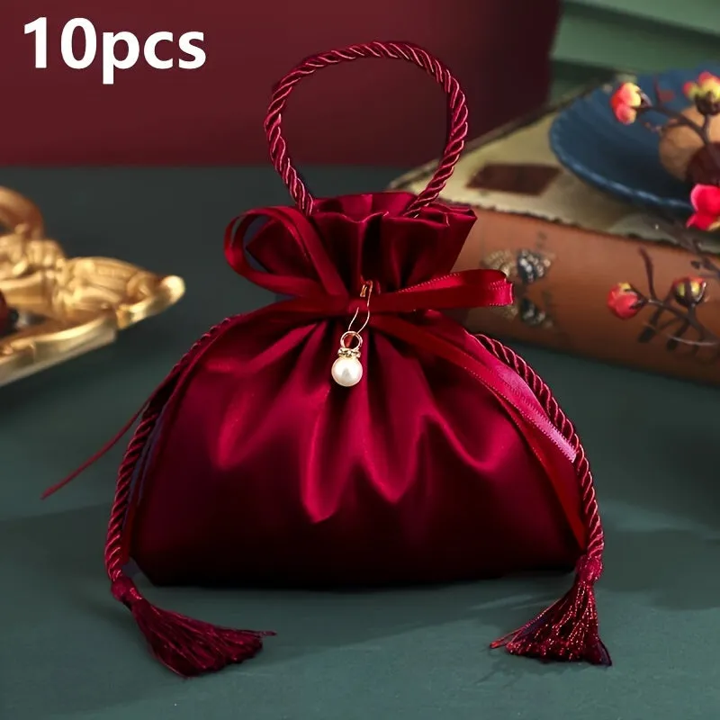 FLIXBLANY 10pcs Red Satin Drawstring Candy Bags with Pearl Charm and Tassel, Foldable Handheld Gift Bags for Wedding, Christmas, Birthday Party Decorations and Packaging
