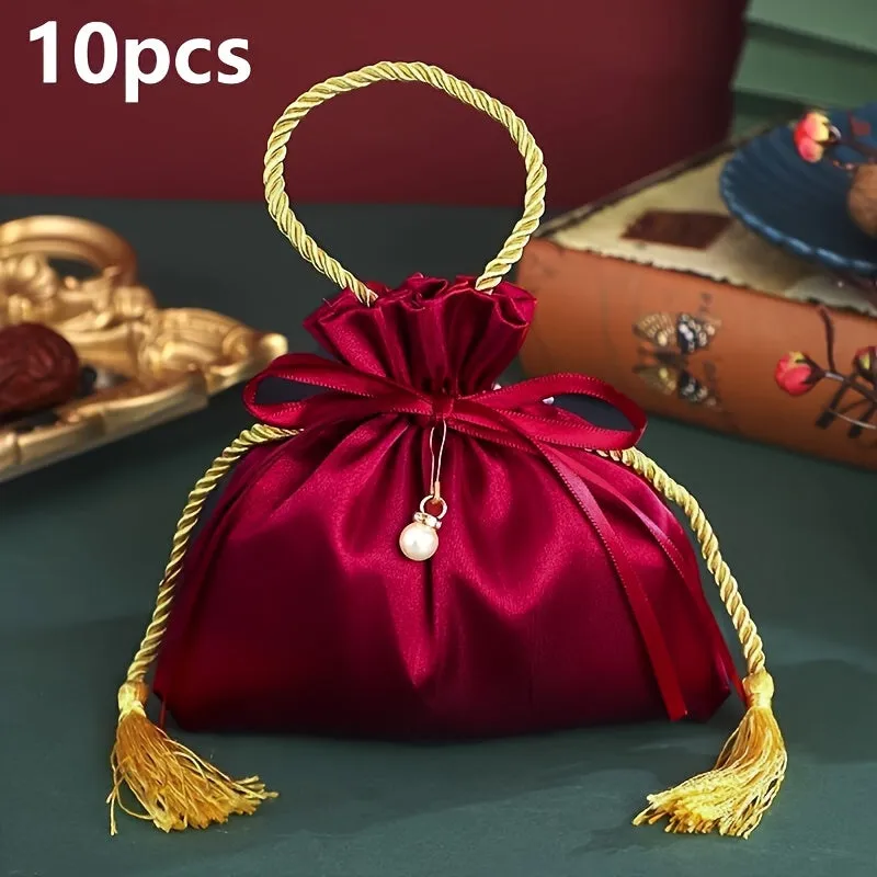 FLIXBLANY 10pcs Red Satin Drawstring Candy Bags with Pearl Charm and Tassel, Foldable Handheld Gift Bags for Wedding, Christmas, Birthday Party Decorations and Packaging
